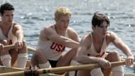 Callum Turner (center) seen as Joe Rantz in The Boys in the Boat (Image via Facebook/@The Boys In The Boat Movie)